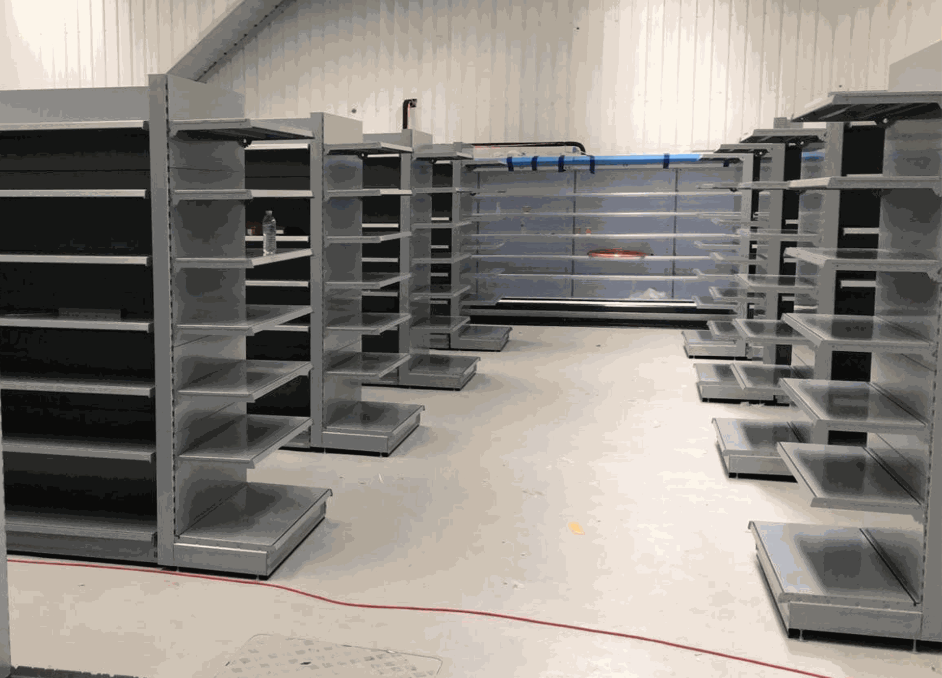 Supermarket layout design with gondola shelving runs – DLG Shopfitting